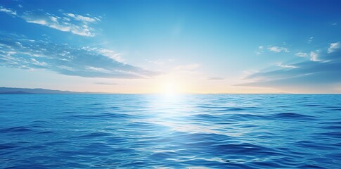 sunrise and cloudy blue sky over calm sea or ocean, panoramic view of sea horizon, idyllic seascape 