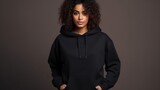 Fototapeta  - Handsome young black  female wearing black blank cotton hoodie with space for your logo or design generative ai