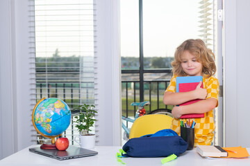 Aufkleber - Portrait of nerd student puts school supplies and books in a backpack. School child student learning at home, study english language. Elementary school child doing homework in her room.