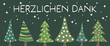 Herzlichen Dank - Schriftzug in deutscher Sprache. Dankeskarte mit Weihnachtsbäumen.