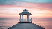 Beautiful Sunset Scenery Showcasing A Solitary Gazebo Amidst The Vastness Of The Ocean.