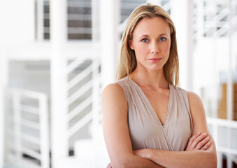 Canvas Print - Portrait, serious and a business woman arms crossed in her professional office for company management. Corporate, workplace and a confident a mature CEO, manager or boss with a development mindset