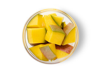 Sticker - Slice of ripe organic mango with skin on white background.Top view.Macro.