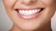 © Krtola  - Women with beautiful white teeth and a smile, close up