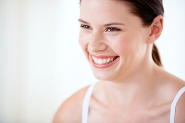 Canvas Print - Happy, portrait and woman with skincare from beauty, cosmetics and white background in studio. Model, smile and person with luxury dermatology, facial and skin glow from wellness in spa or salon