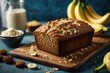 Banana bread on the table on blue background, banana nut cake, muffin with banana, pie with nuts and banana, pie with walnuts and banana, cake with banana, banana cake on the table