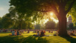 A vibrant city park in summer with people picnicking and relaxing on the grass.