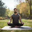 © Aqsapics - Young indian man doing meditation at park