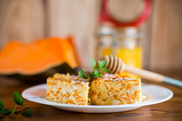 Sticker - Cooked cottage cheese casserole with pieces of pumpkin inside.