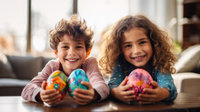 Portrait of two children holding painted Easter eggs