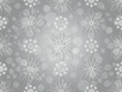 Vector hand drawn geometric Christmas seamless pattern with snowflakes and balls on a silvery gradient background
