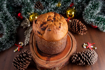 Wall Mural - Delicious panettone (Chocottone) with chocolate chips on wooden table