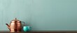 White brick wall with copper antique tea pot on the top of shabby chic vintage turquoise cabinet and hanged painting in living room. Copyspace image. Header for website template