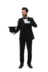 Wall Mural - Happy magician showing magic trick with top hat on white background