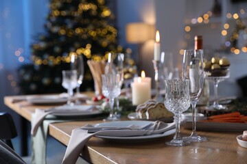 Poster - Christmas table setting with festive decor and dishware indoors