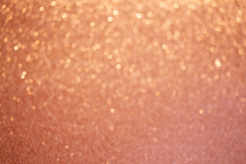 Sticker - Christmas holiday glittering defocused Peach Fuzz background with bokeh lights