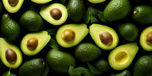 Top View Fruit Background With Fresh Cutted Green Avocados 