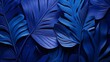 © PhotoRK - paper background with blue tropical leaves, a lot of isolated negative space, in the style of monochromatic realism