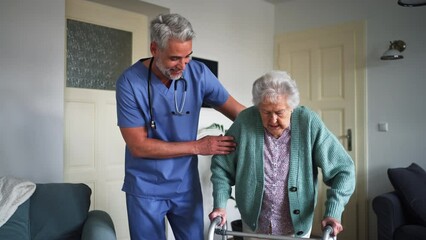 Wall Mural - Caregiver helping senior woman to walk with walker in her home.