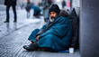 Gray everyday life: homeless person in the cold of the city