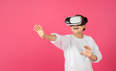 Aufkleber - Excited asian woman using VR glasses, touching something invisible at copy space
