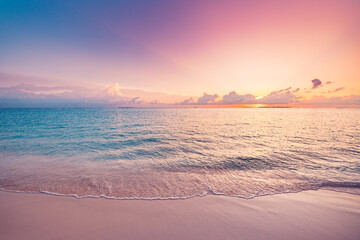 Wall Mural - inspirational ocean beach sunset. colorful sunny sky clouds. calm peaceful sea waves soft sand medit