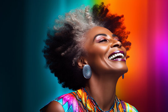 mature dark skin woman with black and gray afro hair isolated on abstract background, happily smilin