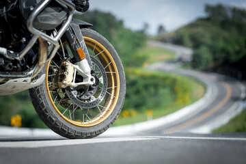 Wall Mural - motorcycle in a sunny motorbike on the road riding.with sunset light. copyspace for your individual text. classic motorcycle.	