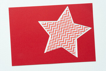 Canvas Print - zigzag star inside a red star frame on white