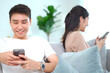 © DG PhotoStock - Smartphone - social media addict problem in young people.
