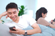 © DG PhotoStock - Smartphone - social media addict problem in young people.