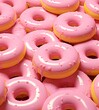 dozens of pink donuts doughnut rings on a yellow surface, hyper-realistic water
