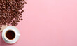 a cup of coffee seen from above on a pink background