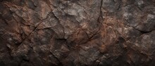 Dark Brown Rock Texture Background. Dark Red Brown Rough Mountain Surface With Cracks. Textured Stone Background With Space For Design