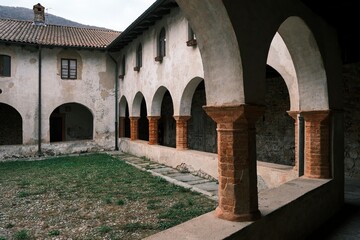 Wall Mural - The ancient abbey of San Gemolo in the province of Varese, Italy