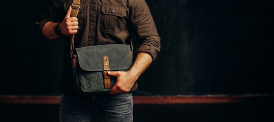 Wall Mural - style and people concept - close up of hipster man with stylish shoulder bag