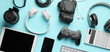 © Pixel-Shot - Different modern devices and gadgets on light blue background