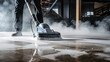Closeup of janitor cleaning floor with polishing machine indoors. Scrubber machine for stone or parquet floor cleaning