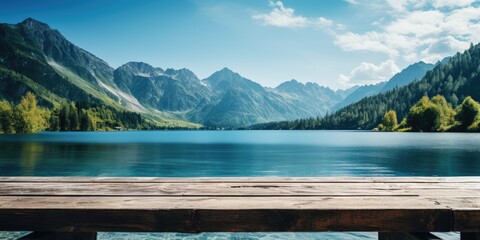 Wall Mural - Empty wooden table against the backdrop of a summer mountain lake, copy space. Generative AI