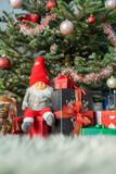 Fototapeta Kwiaty - Wonderful presents under beautifully decorated christmas tree
