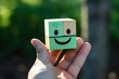 Smiling green happy face Smiley Laugher, friendly happy square cube puzzle smile satisfied client review experience, customer success, client service good positive feedback, lucky affirmation