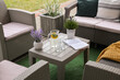 Comfortable furniture with beautiful decor on outdoor terrace