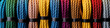 Multicolored climbing ropes for climbing in window of climbing equipment store