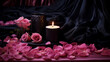 pink and black velvet fabric on the table with rose petal and candle 