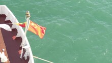 Flying In The Wind At Vessel Stern, National Flag And Emblem Of China