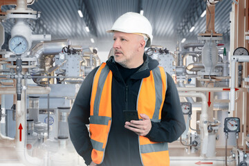 Poster - man factory technologist. factory employee. worker stands in industrial workshop. man technologist h