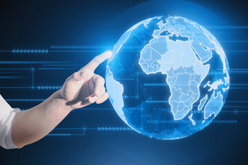 Aufkleber - Close up of businessman hand pointing at bright blue globe hologram and lines on blurry dark background. Metaverse, digital world and network concept.