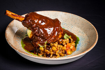 Canvas Print - duck leg with vegetables and sauce.