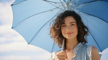 Happy Woman With Sunny Blue Sky Holding A Blue Umbrella Or Sunshade To Protect Her Skin From Sun Light With Return Of Warm Days