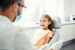 © zamuruev - pediatric dentist with a young patient in dental clinic, Professional stomatology for kid.